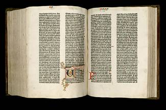 Image of the Gutenberg Bible open to pages 231 verso and 232 recto.
